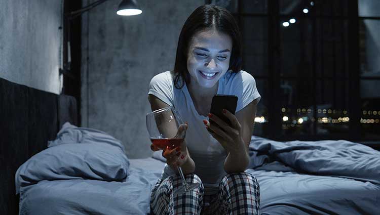 Woman playing with smartphone