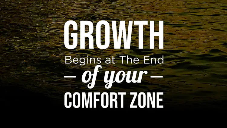 Sign that reads: growth begins at the end of your comfort zone